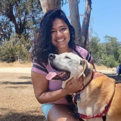 A photograph of me with my dog during a hike.